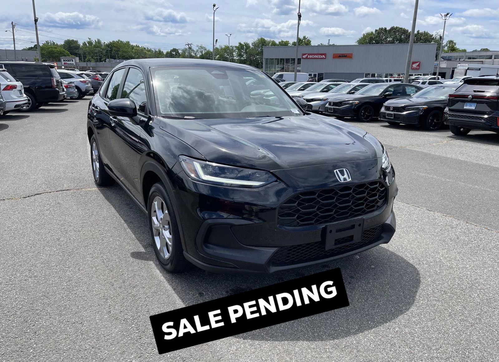 Used 2024 Crystal Black Pearl Honda LX image 1