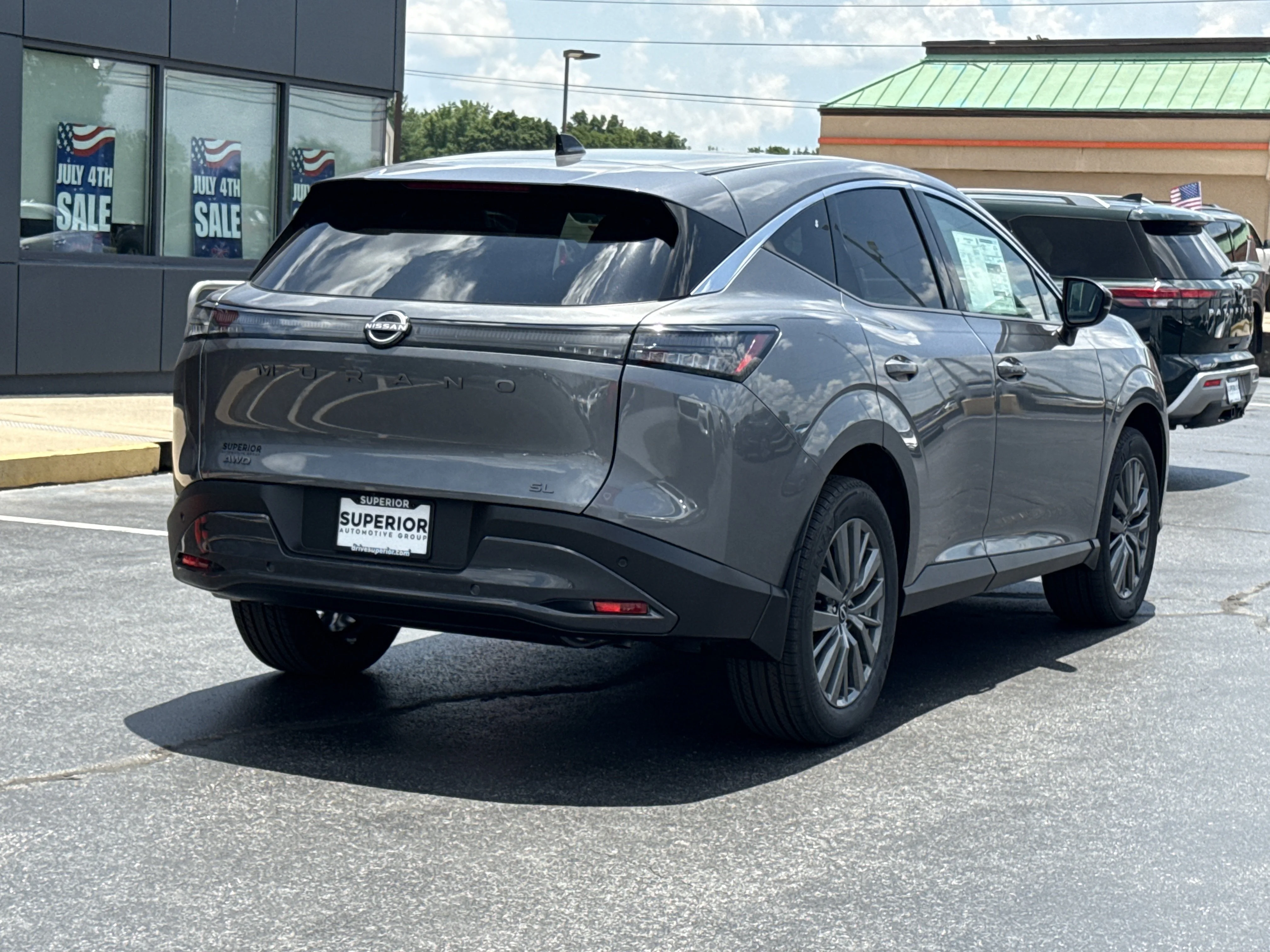 New 2026 Gun Metallic Nissan SL AWD image 4