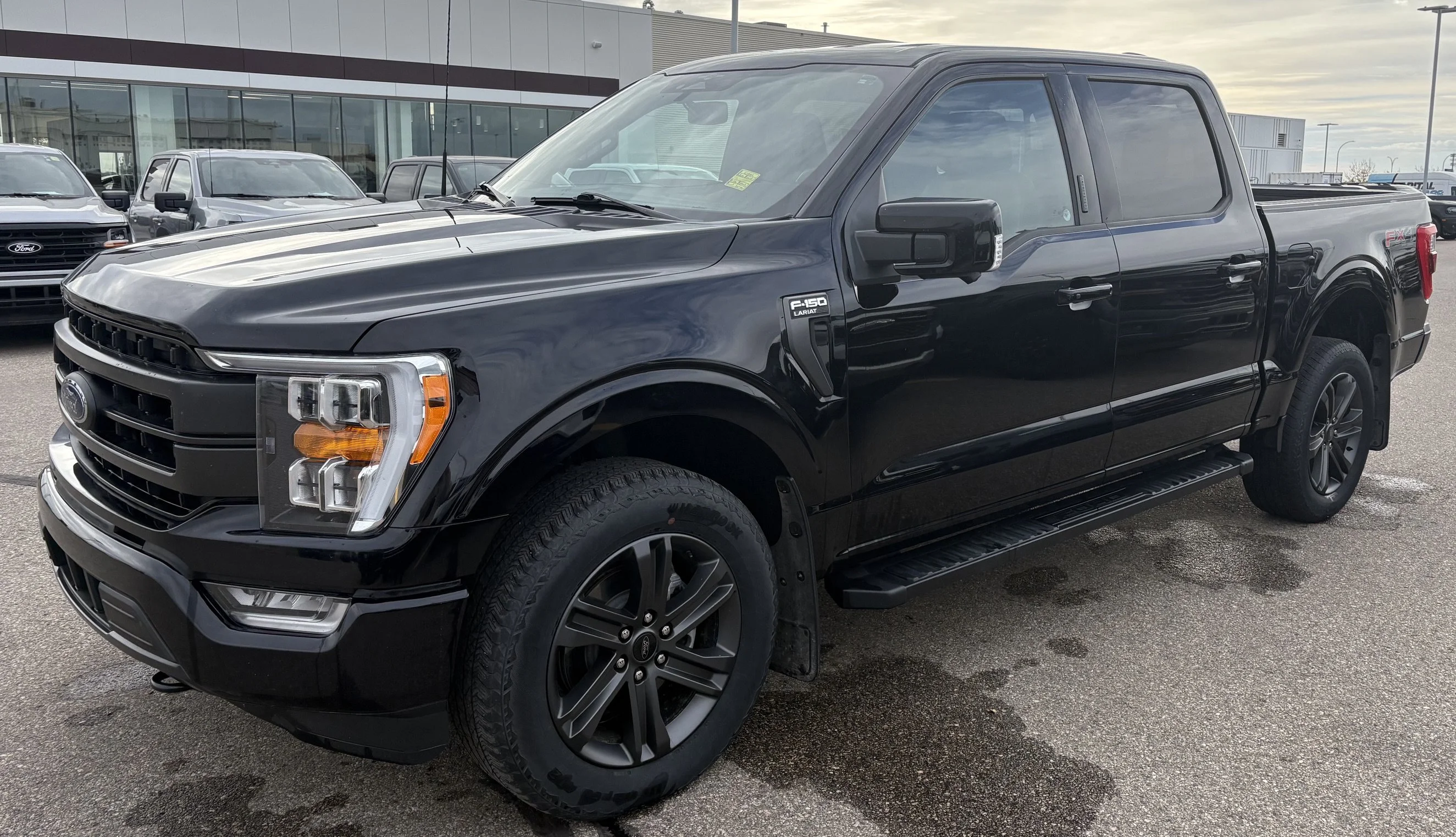Used 2023 BLACK Ford LARIAT SuperCrew   **New Arrival** image 1