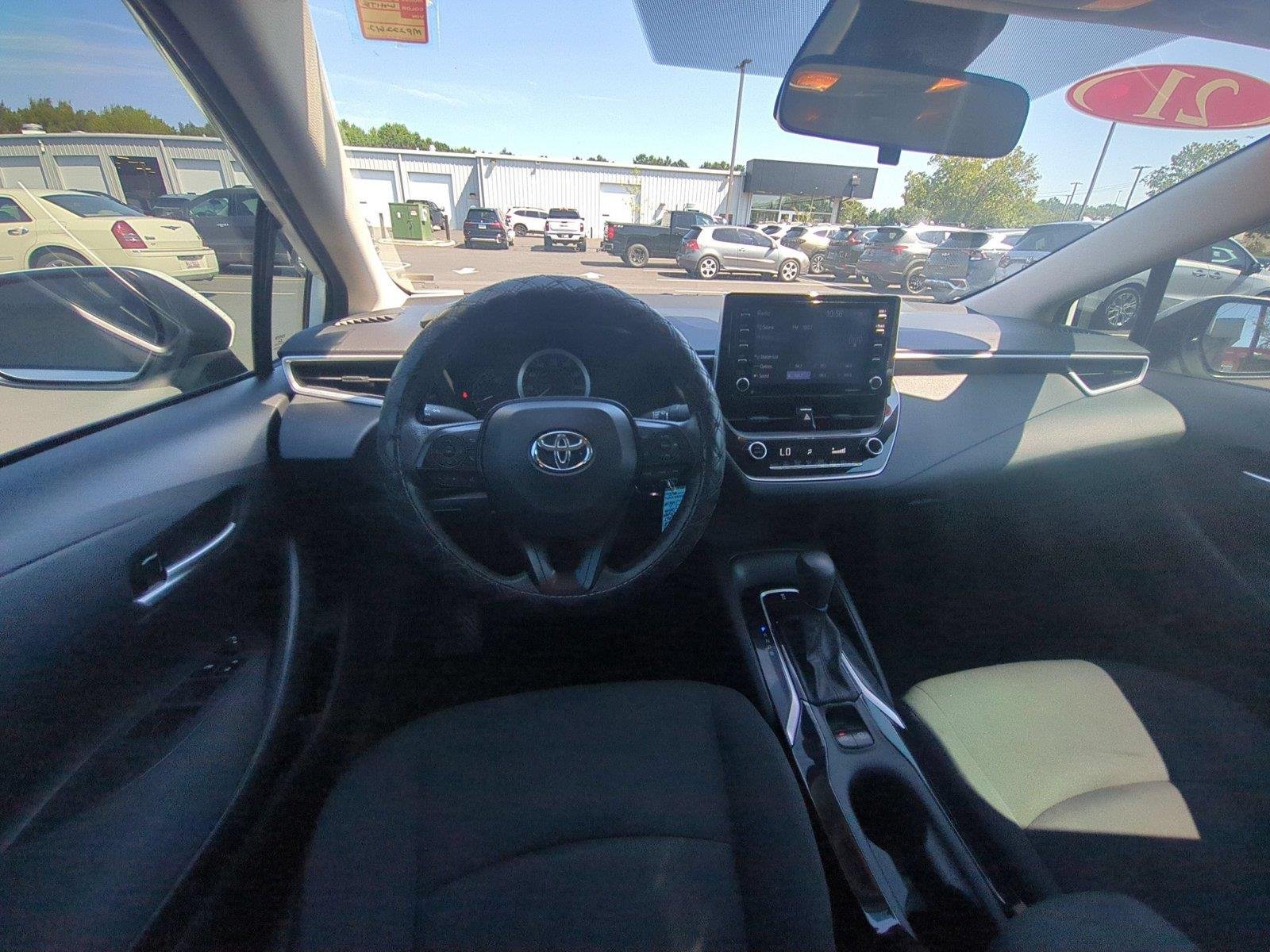 Used 2021 Super White Toyota LE image 30