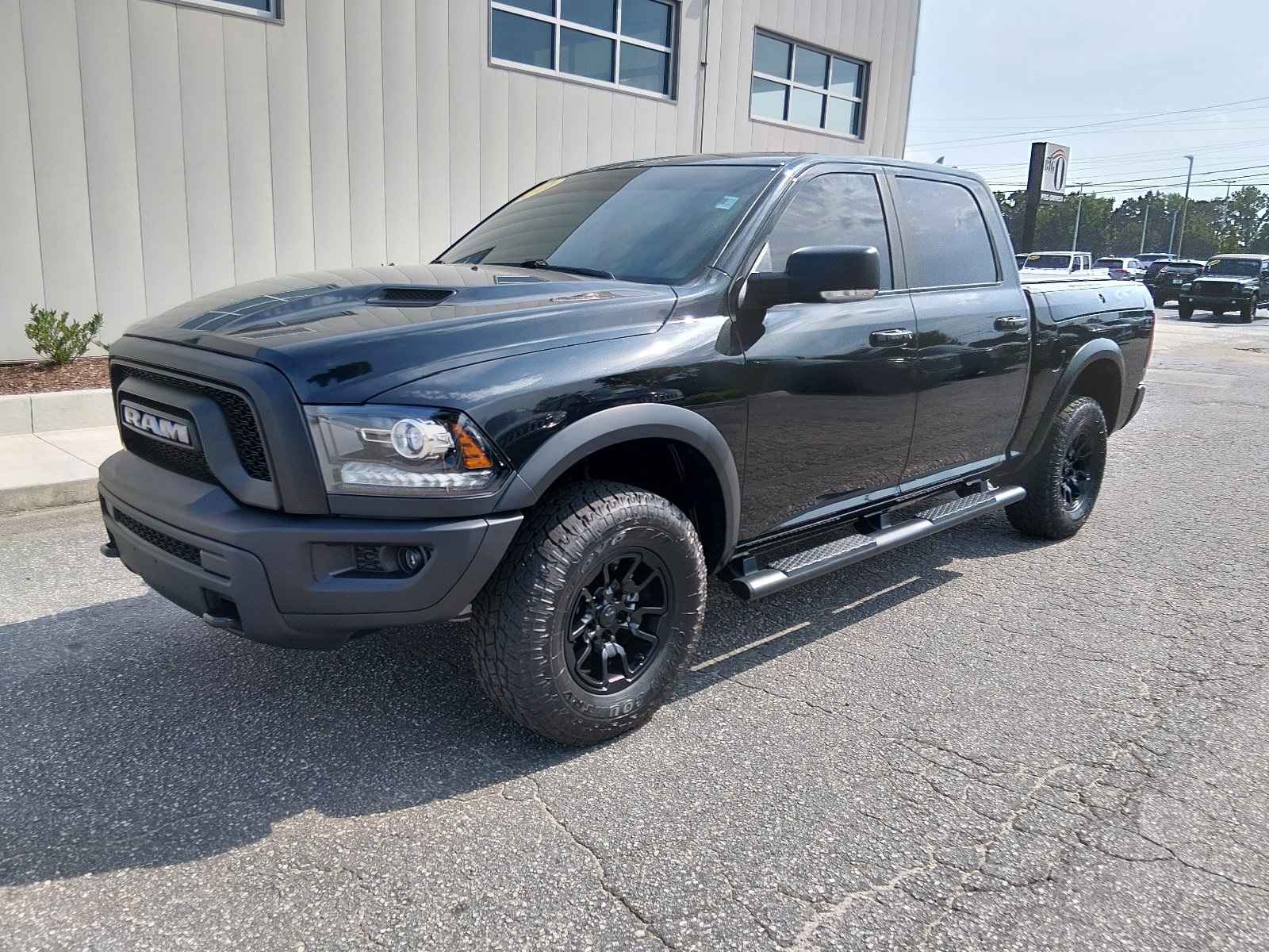 Used 2017 Brilliant Black Crystal Pearl Coat Ram 4x4 Rebel 4dr Crew Cab 5.5 ft. SB Pickup image 7