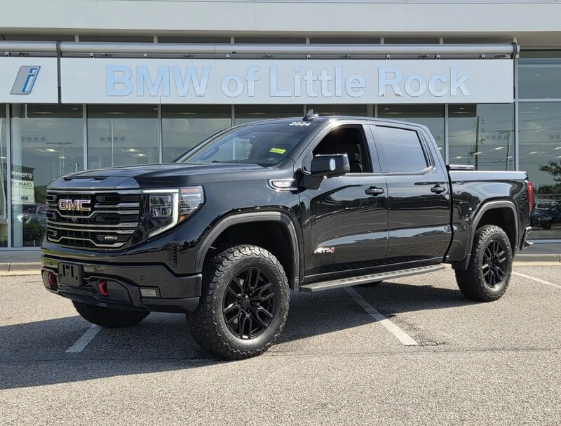 Used 2024 Onyx Black GMC 4WD CREW CAB 147" AT4 image 1