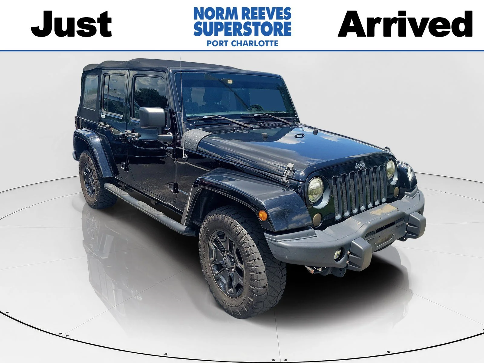 Used 2016 Black Clearcoat Jeep Unlimited Sahara image 1