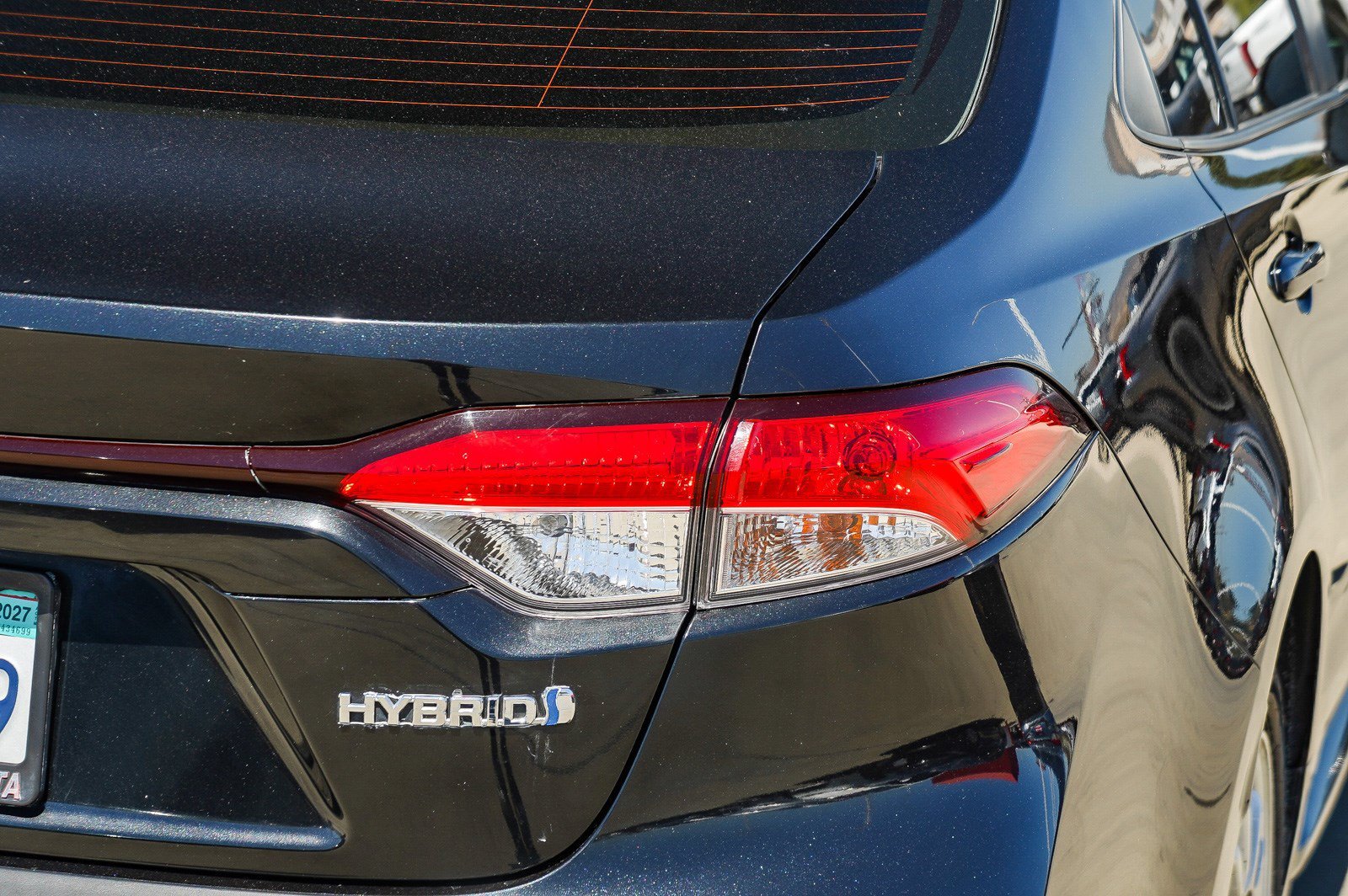 Used 2021 Black Sand Pearl Toyota Hybrid LE image 7