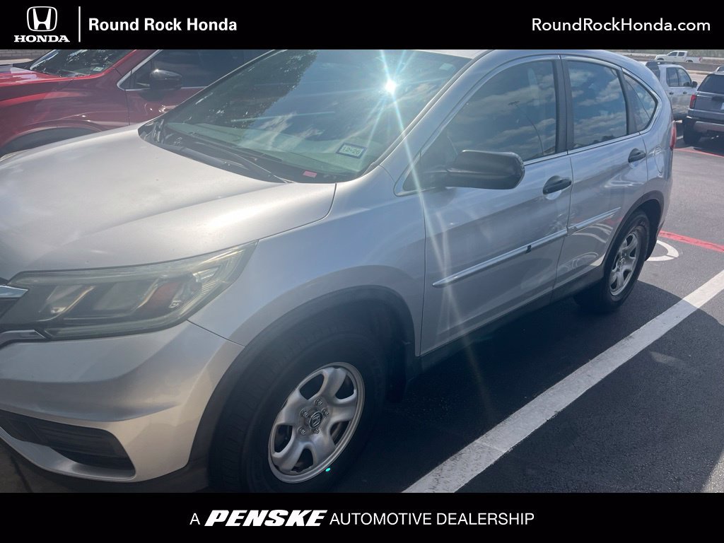 Used 2015 Alabaster Silver Metallic Honda LX image 1