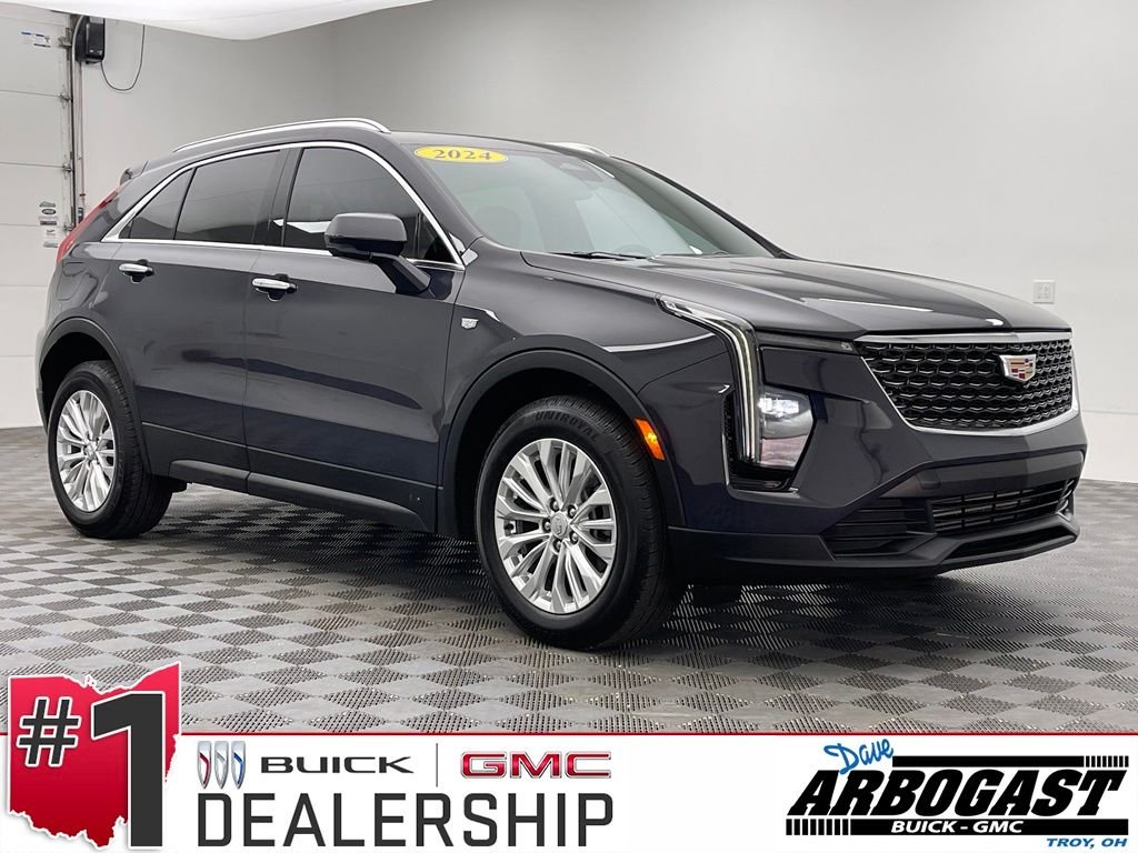 Used 2024 Midnight Sky Metallic Cadillac Luxury image 1