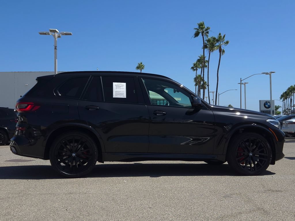 Used 2023 Black Sapphire Metallic BMW sDrive40i image 3