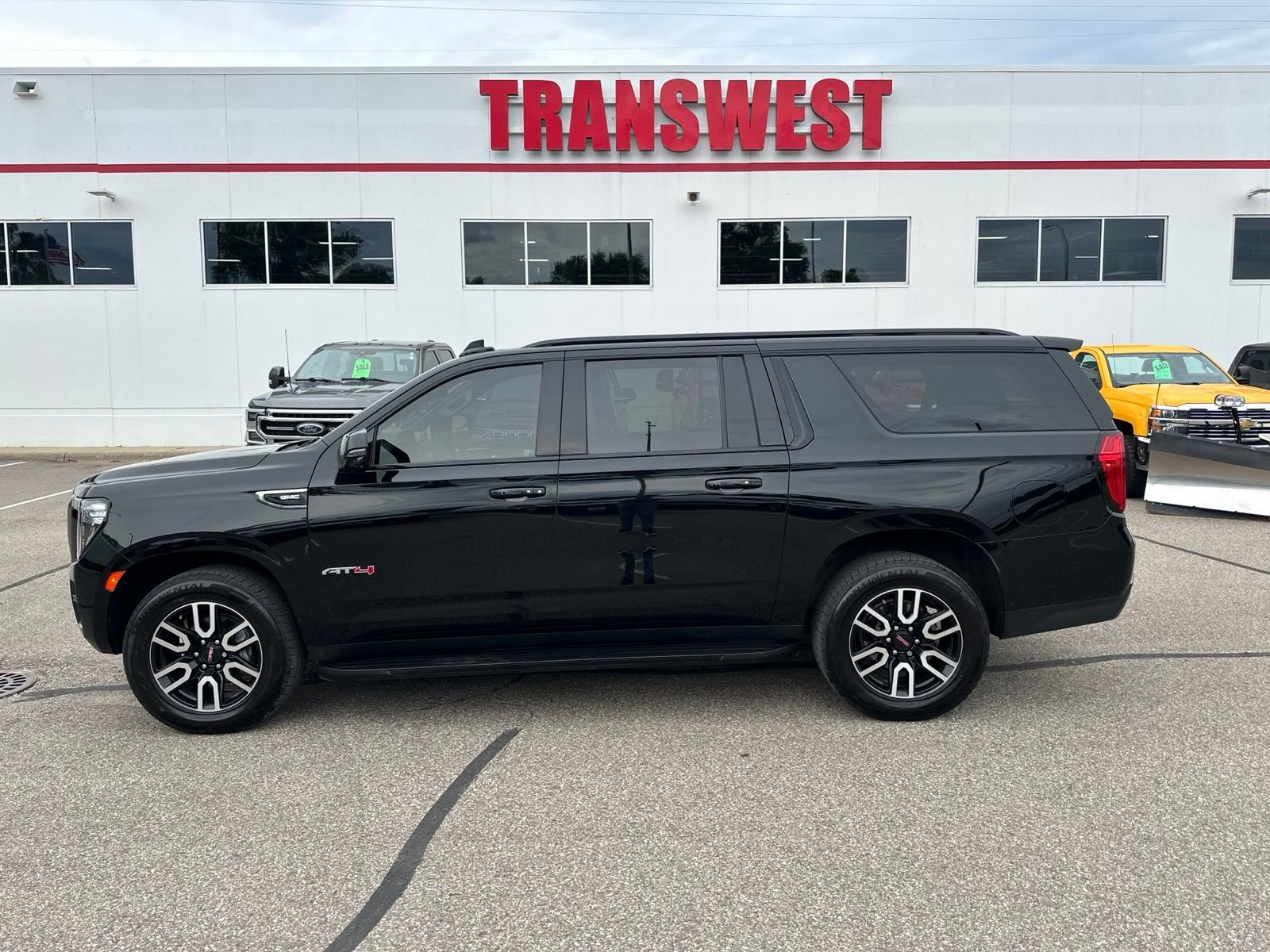 Used 2021 GMC Yukon XL AT4 with VIN 1GKS2HKD8MR439499 for sale in Minneapolis, Minnesota