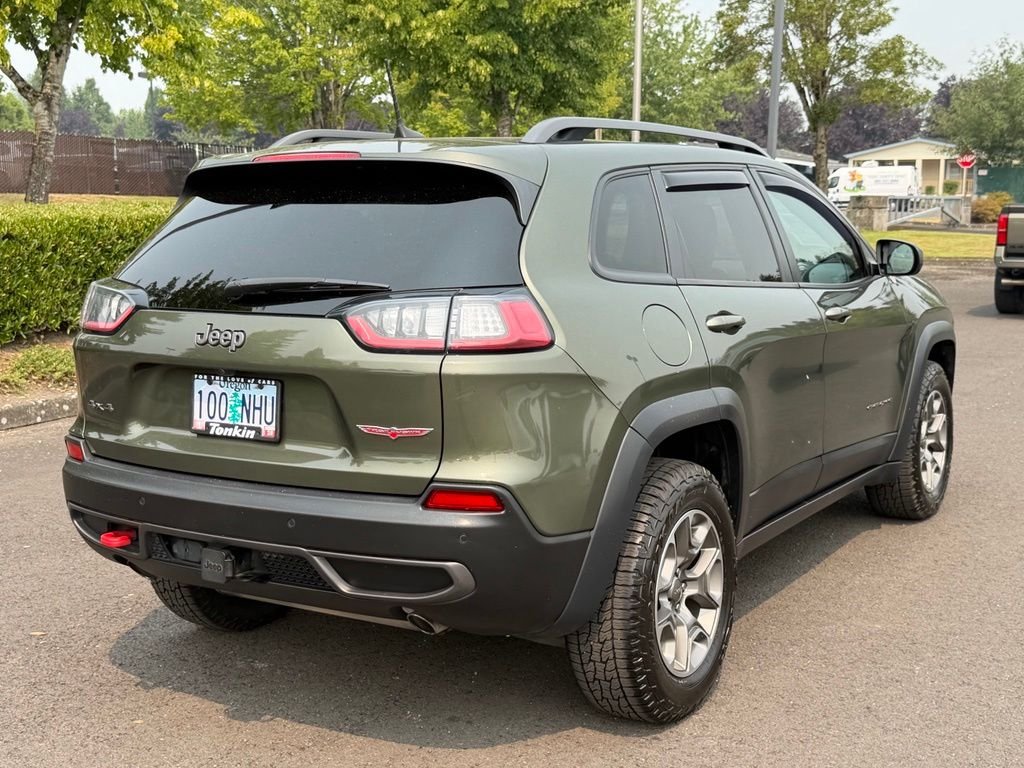 Used 2021 Olive Green Pearlcoat Jeep Trailhawk image 8