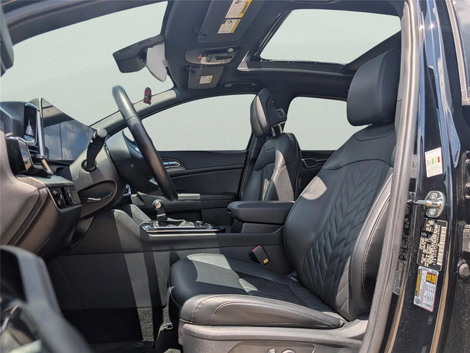 Used 2024 Ebony Black Kia X-Pro image 12