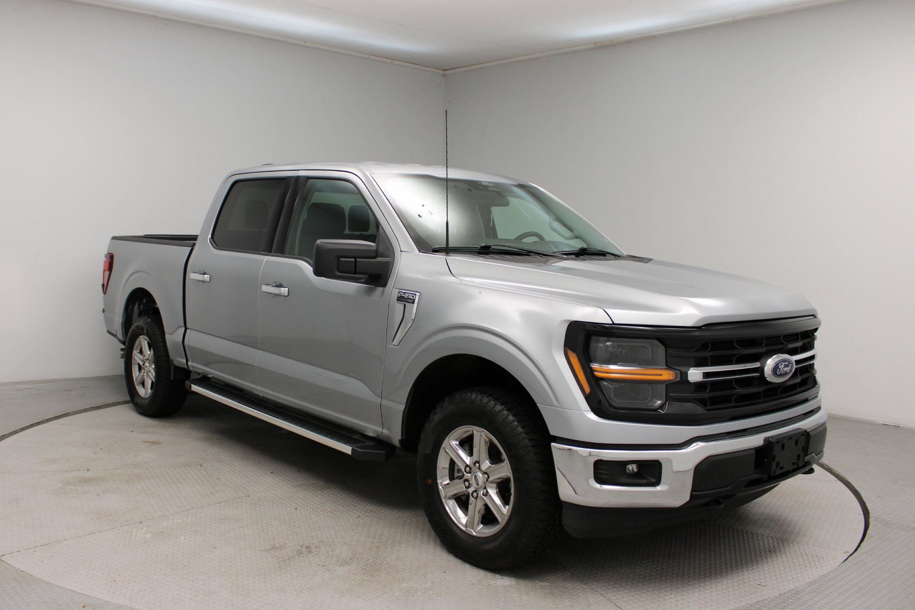 Used 2025 ICONIC SILVER METALLIC Ford XLT 4WD SuperCrew 5.5
