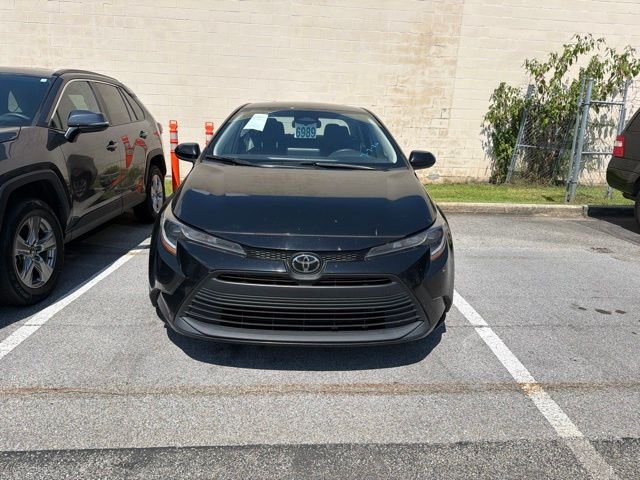 Used 2024 Black Toyota LE image 1