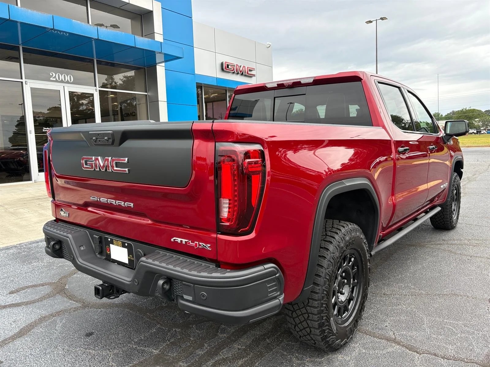 Used 2026 Volcanic Red Tintcoat GMC AT4X image 7