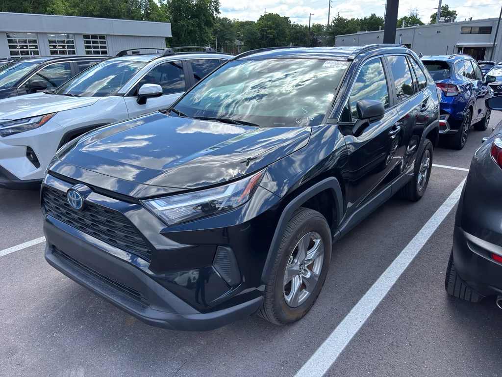 Used 2024 Midnight Black Metallic Toyota Hybrid LE image 2