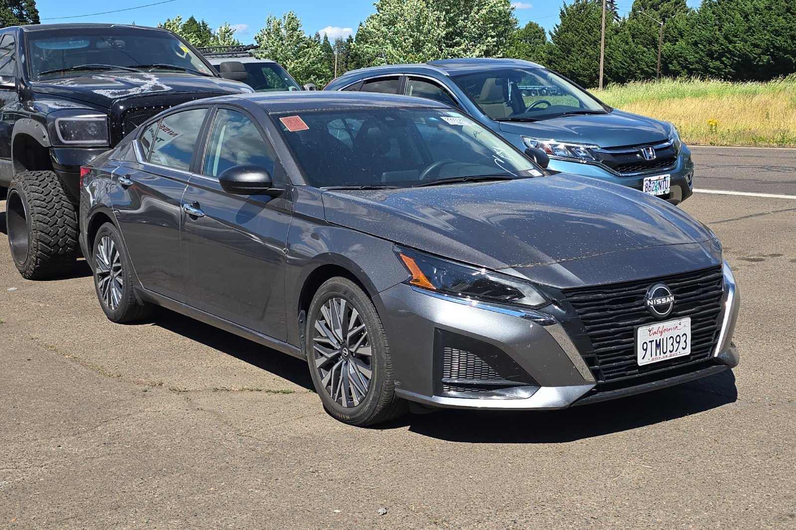 Used 2025 Gun Metallic Nissan SV image 2
