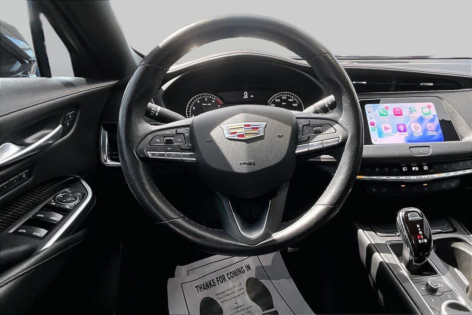 Used 2023 Stellar Black Metallic Cadillac FWD Sport image 6