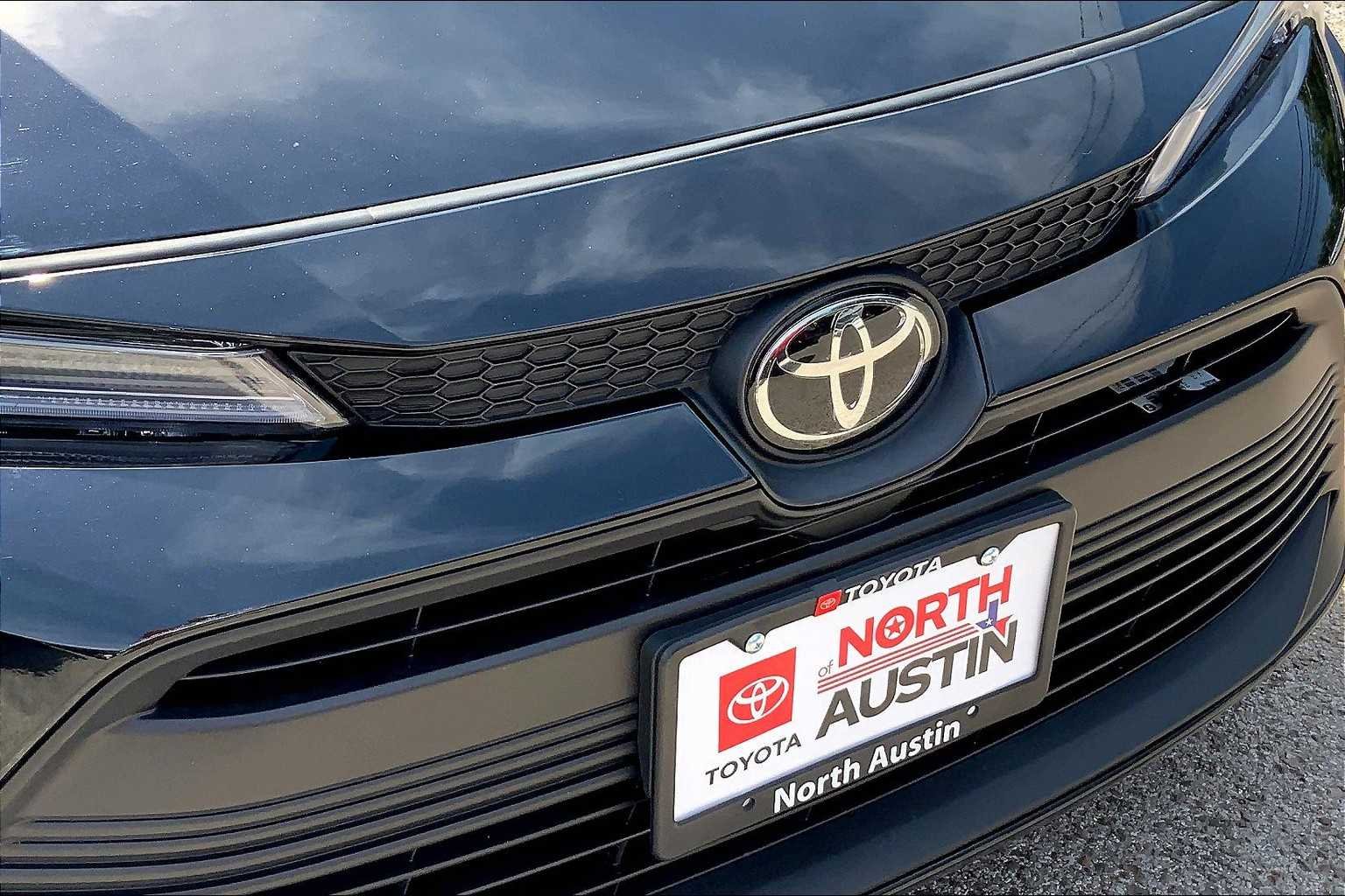 Used 2023 Midnight Black Metallic Toyota LE image 29