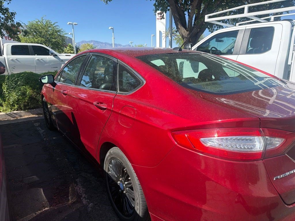 Used 2016 Ruby Red Metallic Tinted Clearcoat Ford SE Hybrid image 2