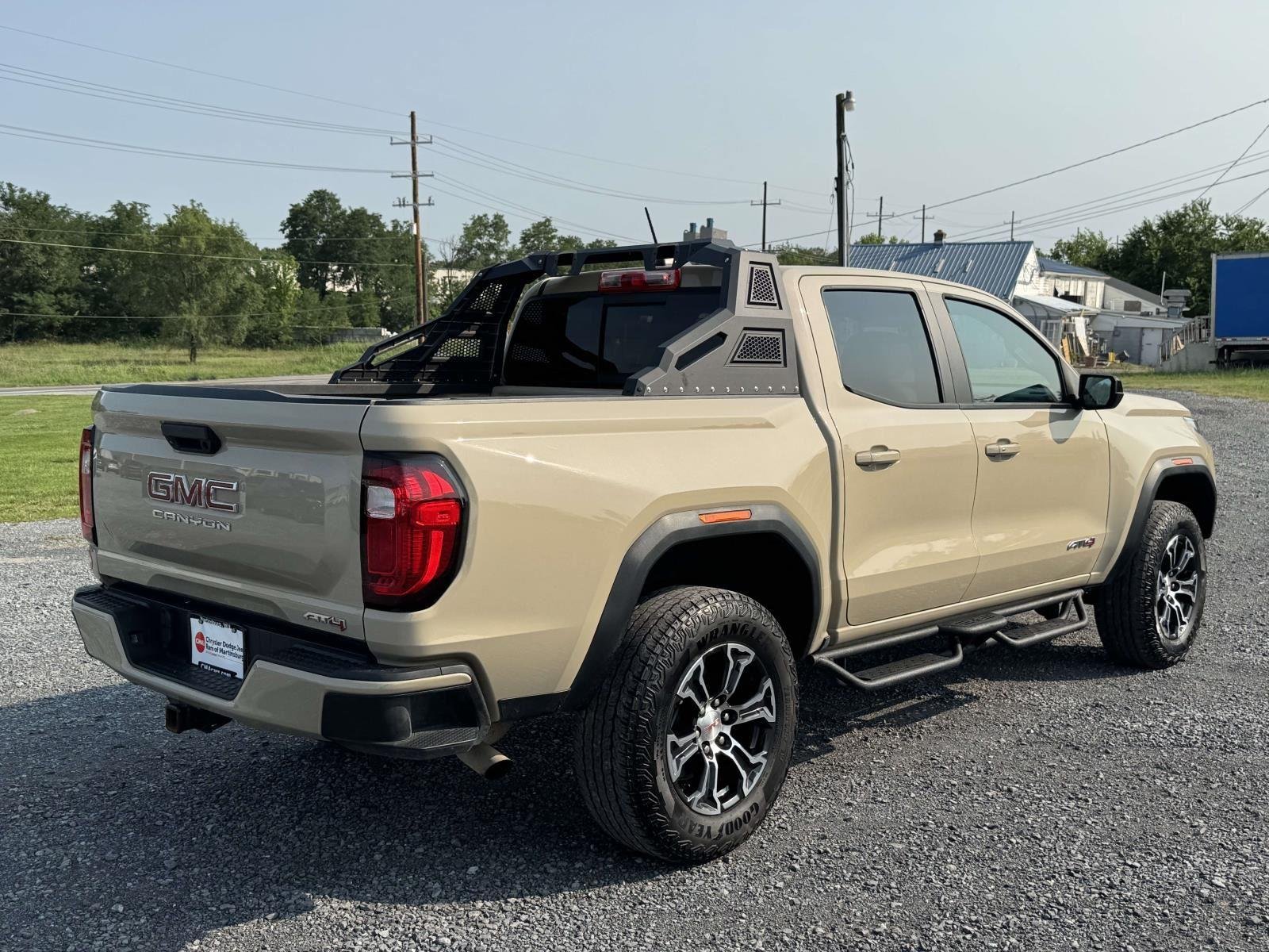 Used 2023 Desert Sand Metallic GMC 4WD AT4 image 22