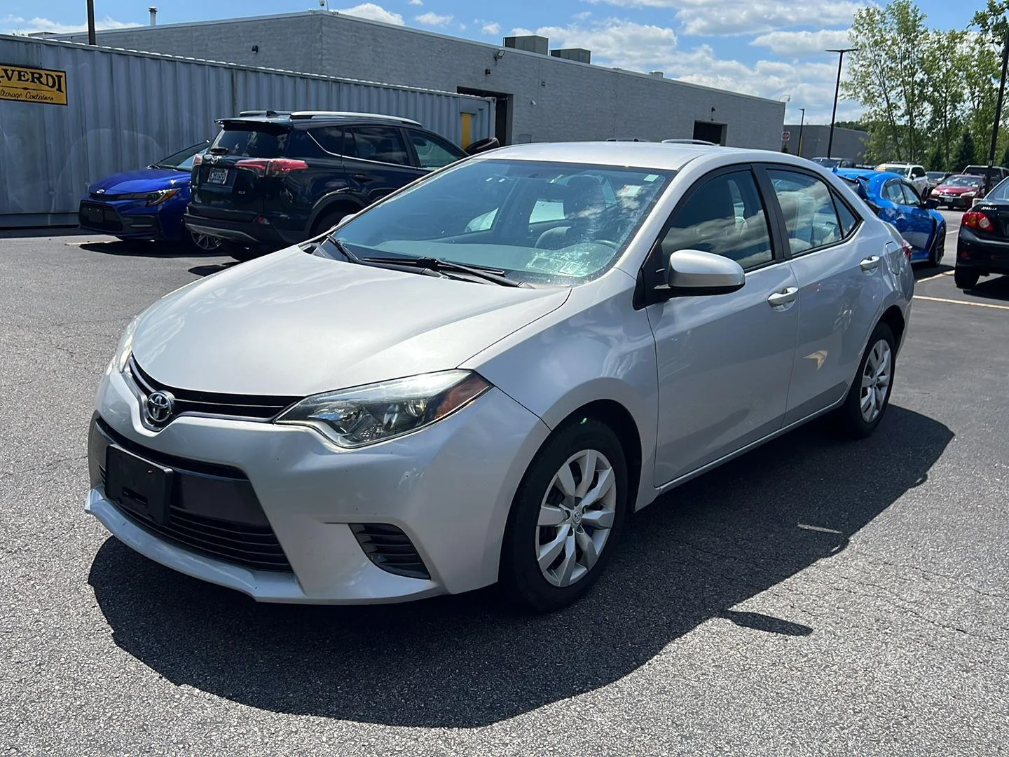Used 2016 Classic Silver Metallic Toyota LE image 2
