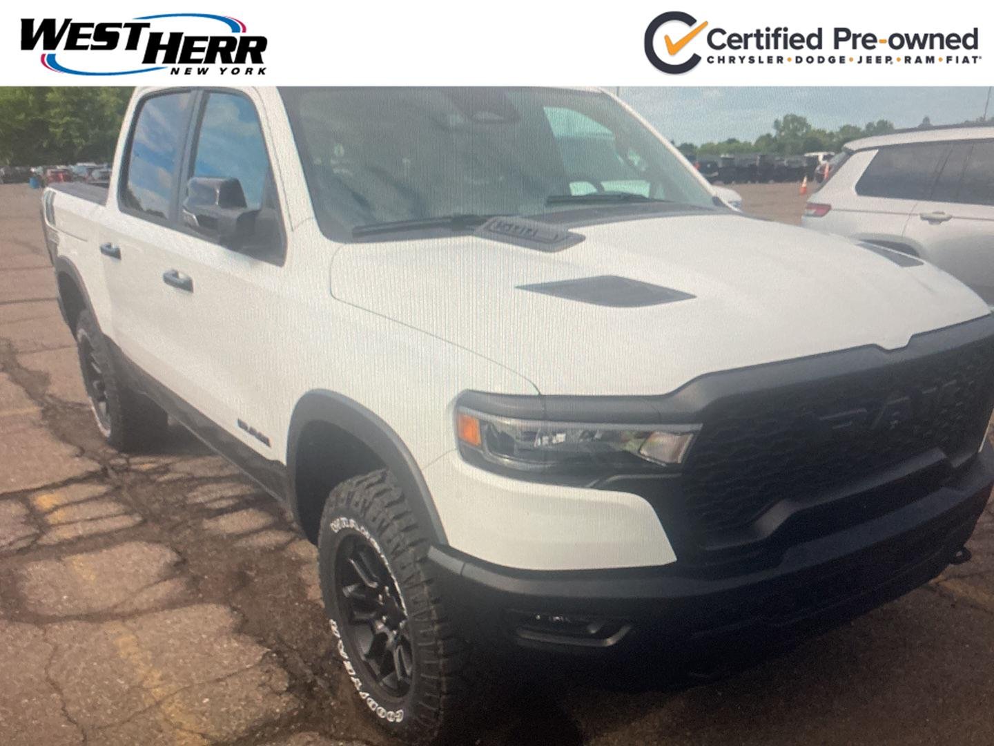 Used 2025 Bright White Clearcoat Ram Rebel image 1