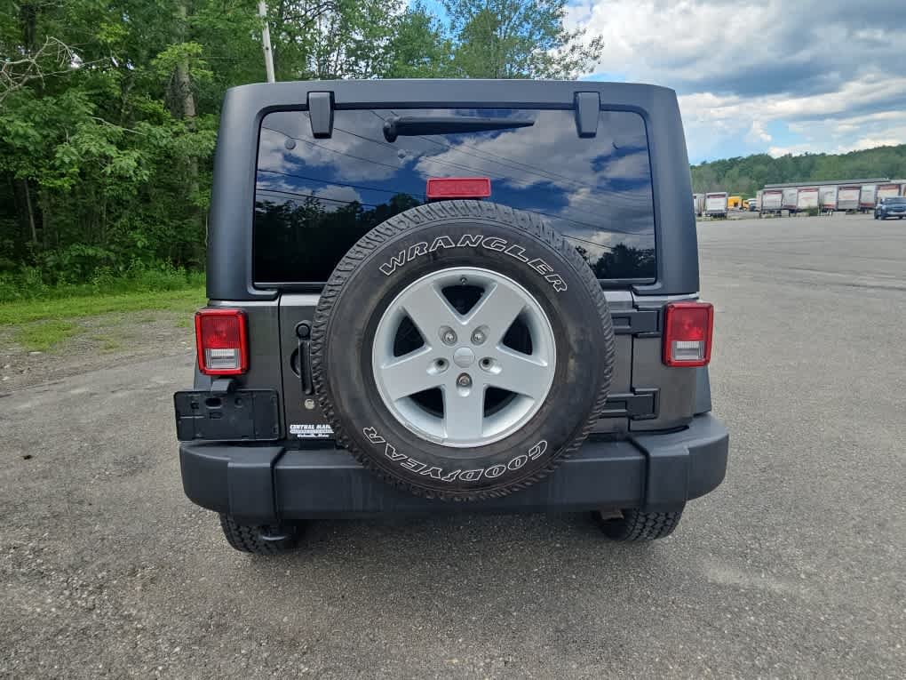 Used 2018 Granite Crystal Metallic Clearcoat Jeep Sport S image 5