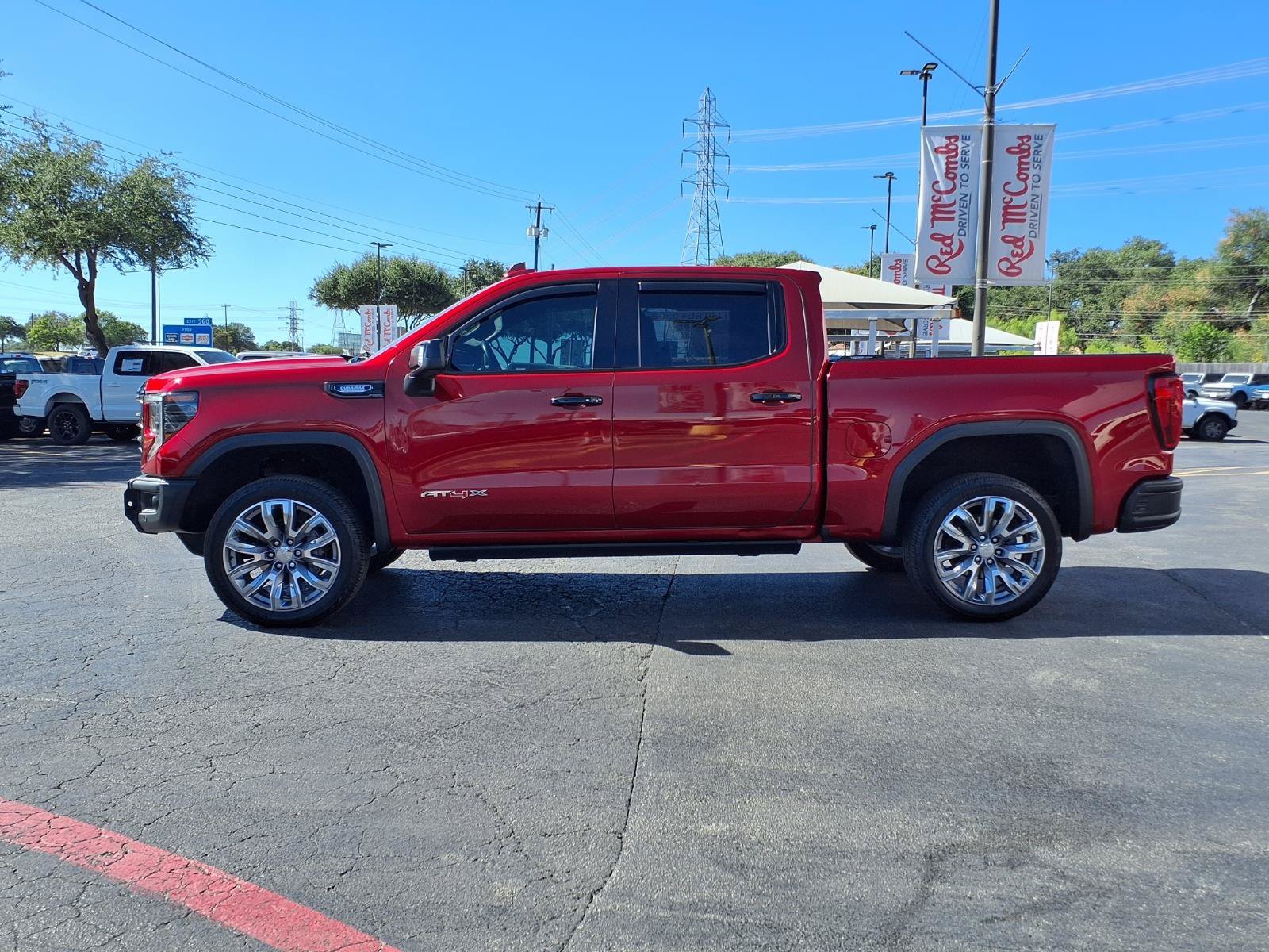 Used 2024 Volcanic Red Tintcoat GMC AT4X image 7