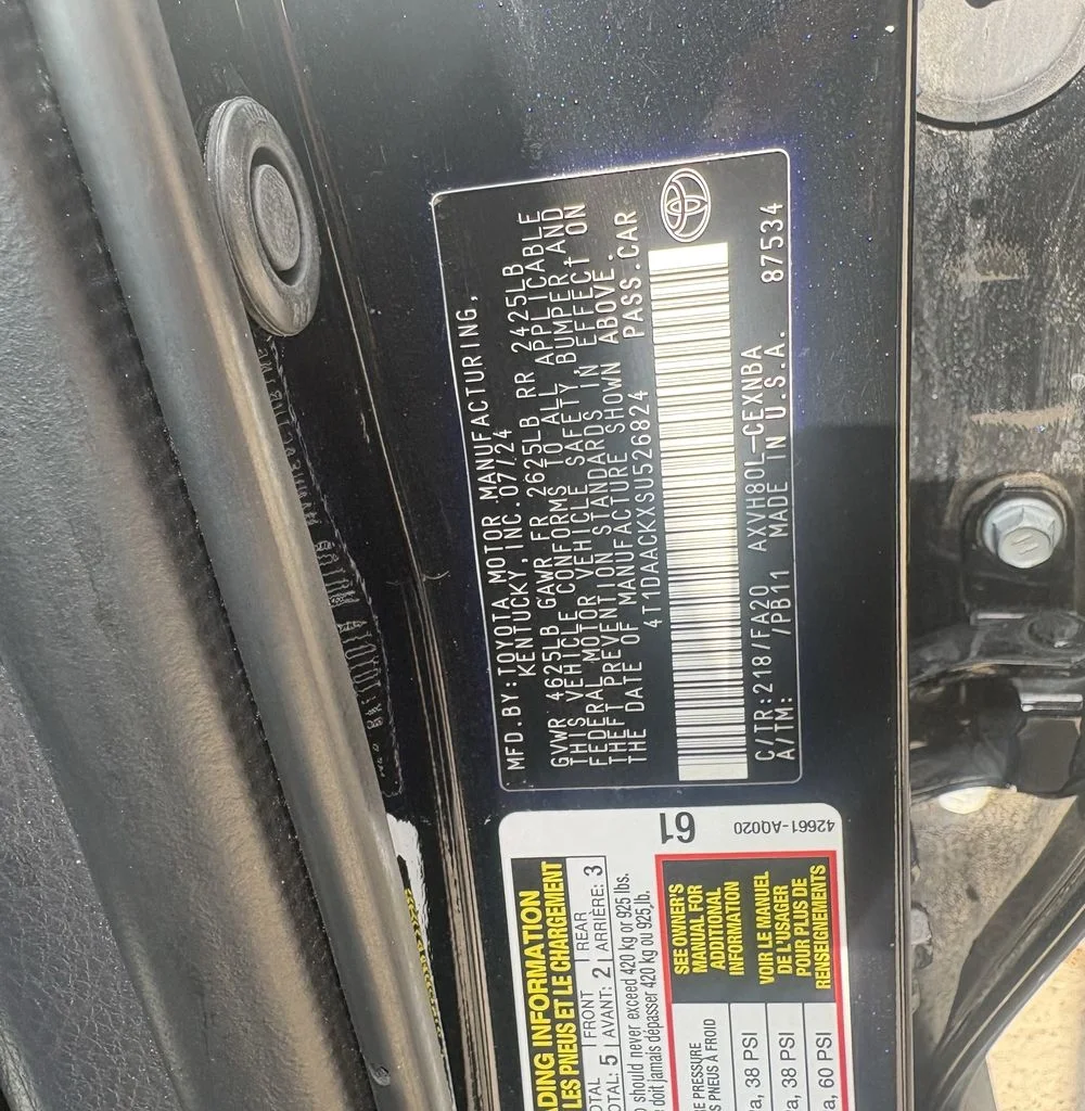 Used 2025 Midnight Black Metallic Toyota LE image 28