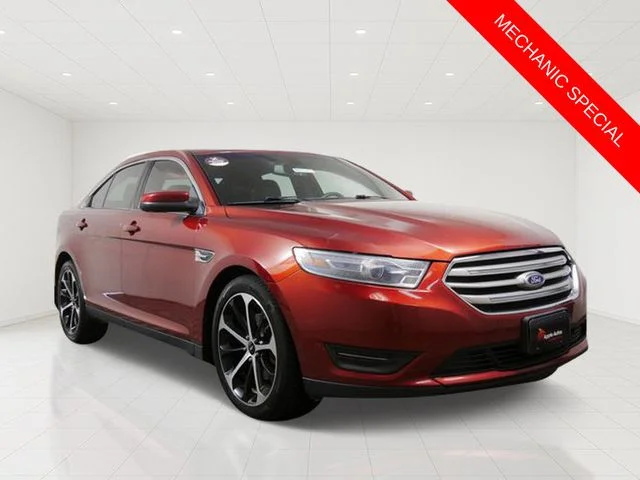 Used 2014 Orange Ford SEL image 1