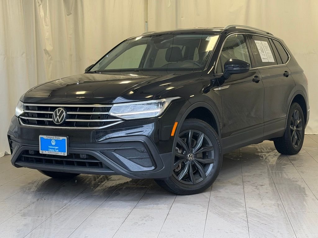 Certified Used 2024 Deep Black Volkswagen 2.0T SE image 1
