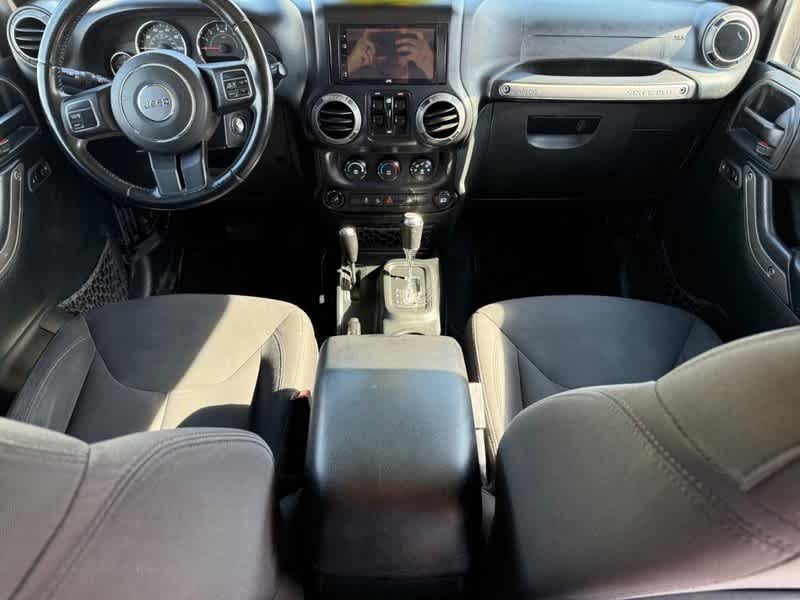 Used 2018 Granite Crystal Metallic Clearcoat Jeep Sport S image 11