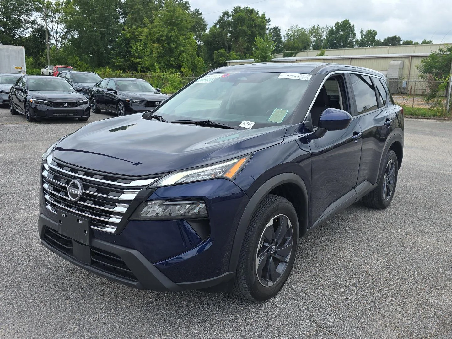Used 2025 Deep Ocean Blue Pearl Nissan SV image 9