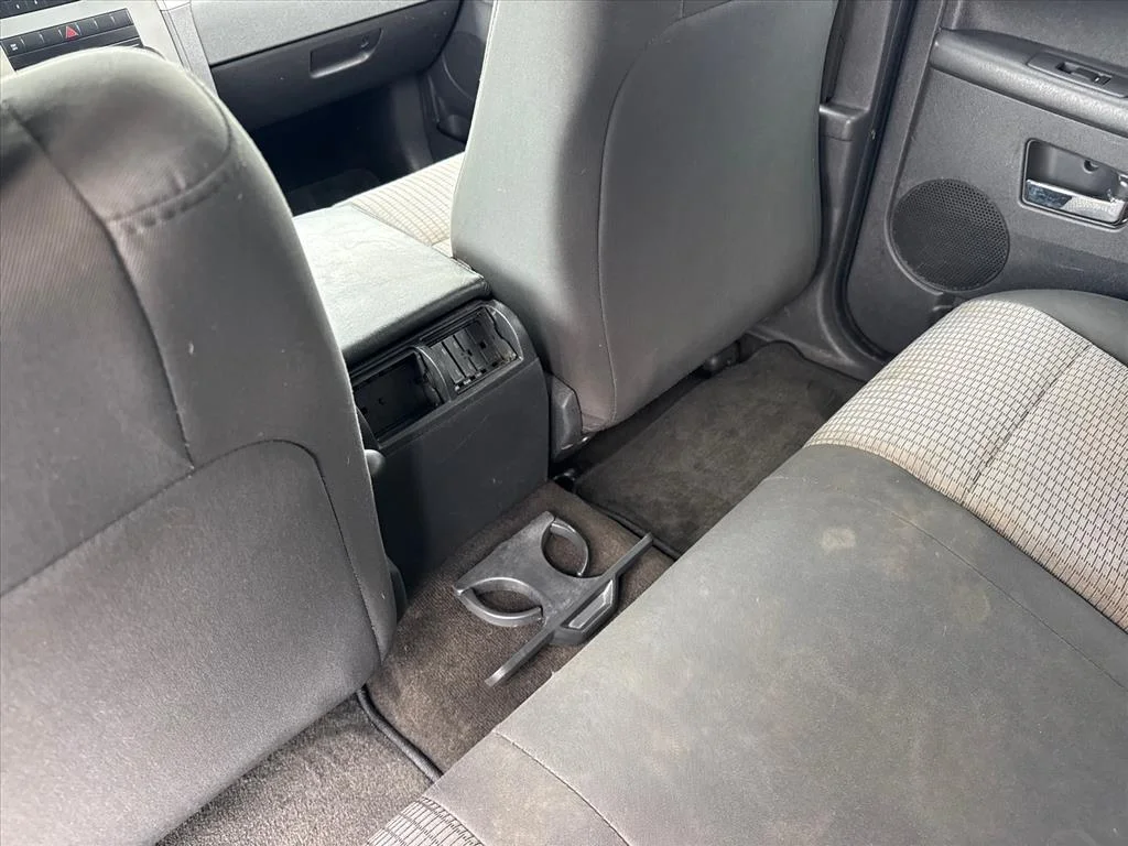 Used 2009 Green Metallic Jeep Laredo image 16