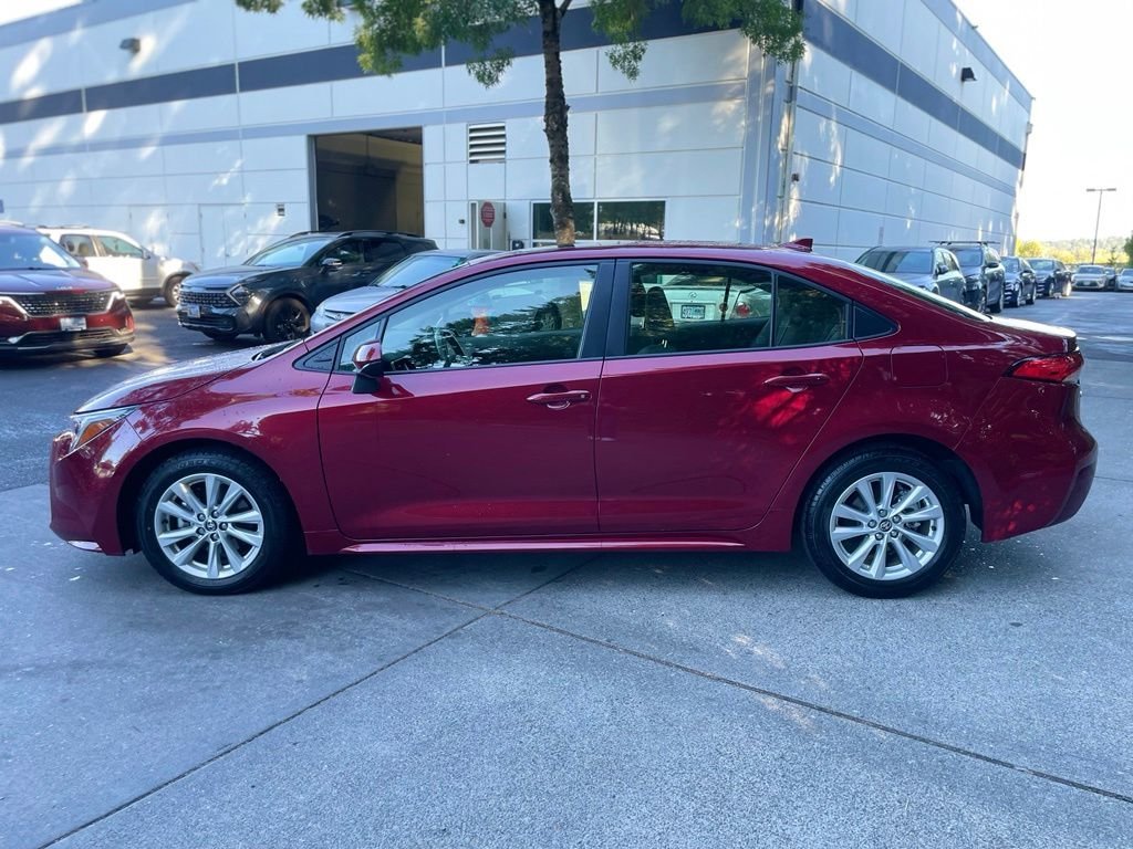 Used 2023 Pearl Toyota LE image 6