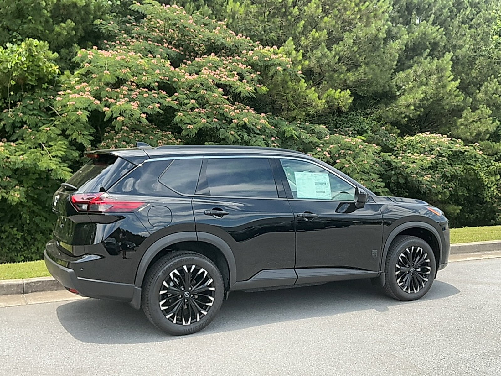 New 2026 Super Black Nissan Dark Armor image 2