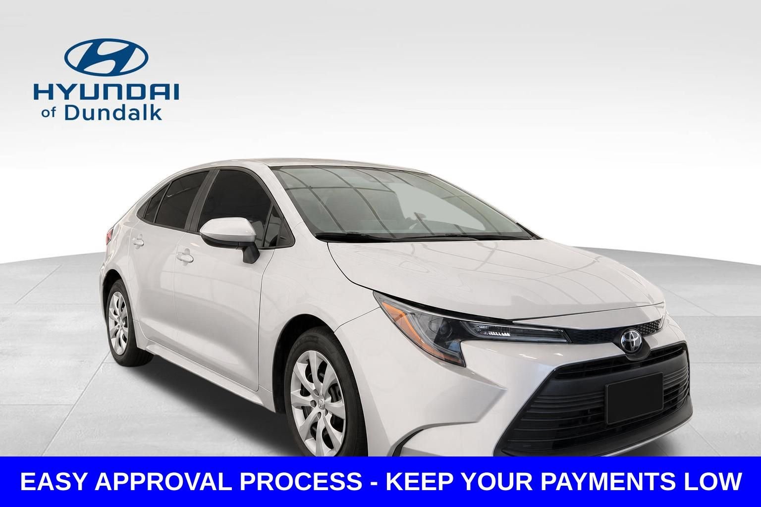 Used 2024 Silver Toyota LE image 1