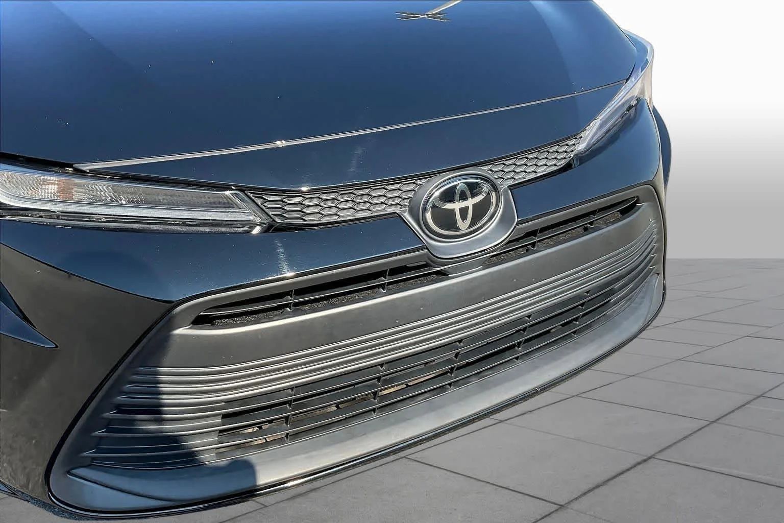 Used 2024 Midnight Black Metallic Toyota LE image 29