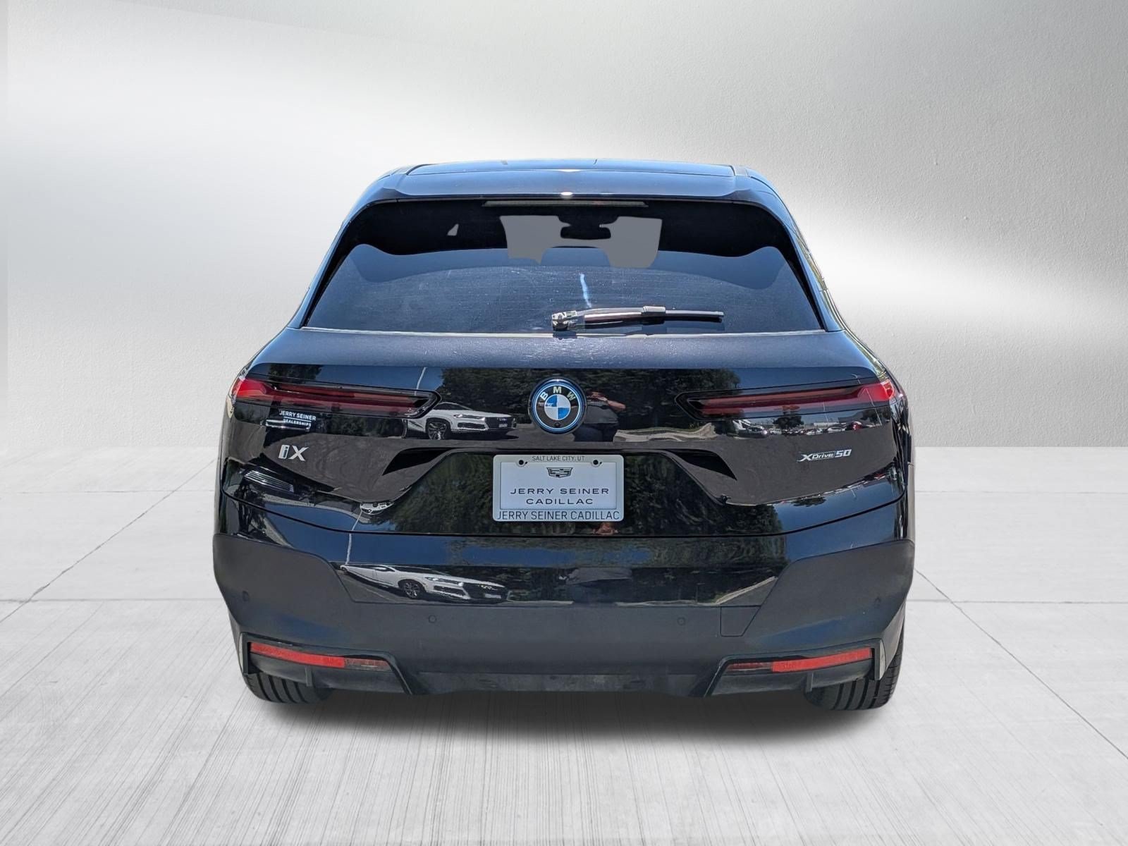 Used 2025 Black BMW xDrive50 image 4
