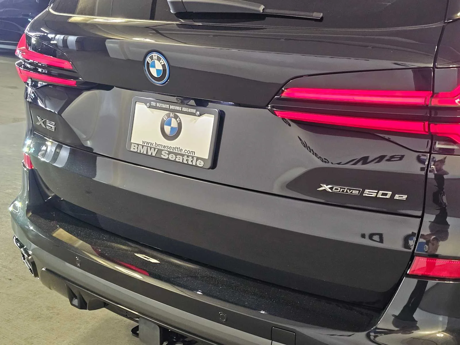 New 2026 Black Sapphire Metallic BMW xDrive50e image 7