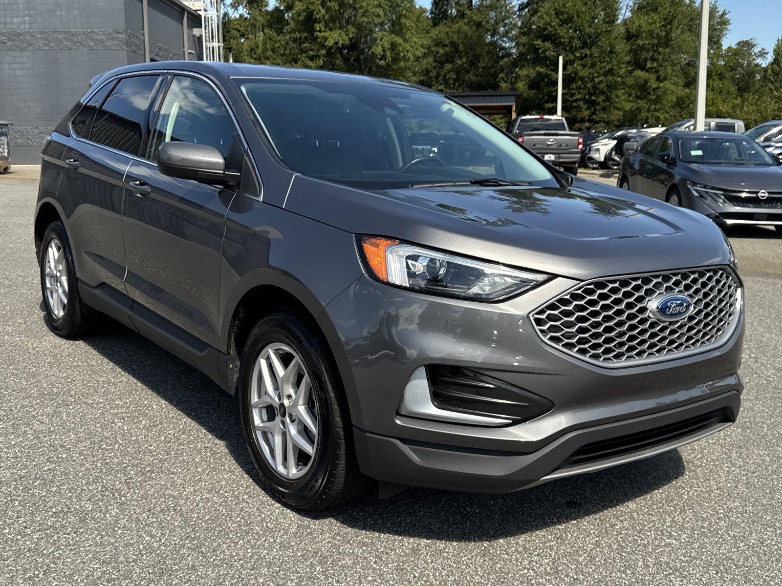 Used 2024 Carbonized Gray Ford SEL image 1
