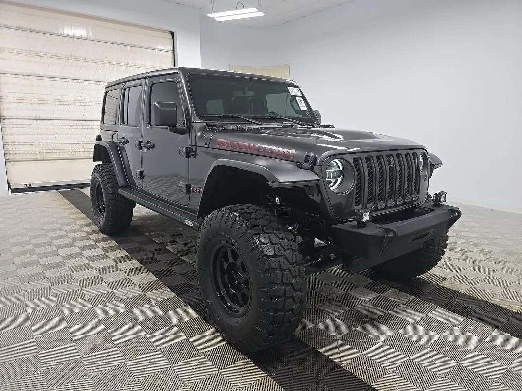 Used 2022 Granite Crystal Metallic Clearcoat Jeep Unlimited Rubicon image 1