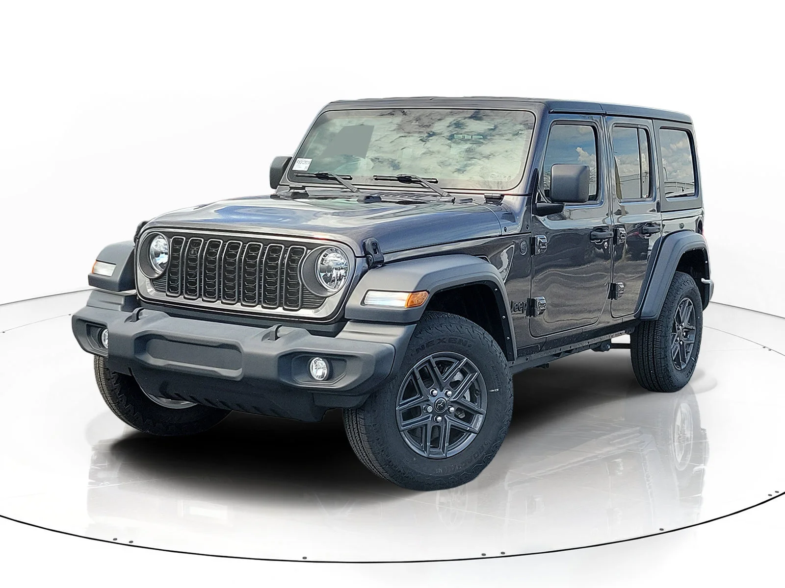 Used 2024 Granite Crystal Metallic Clearcoat Jeep Sport S image 1
