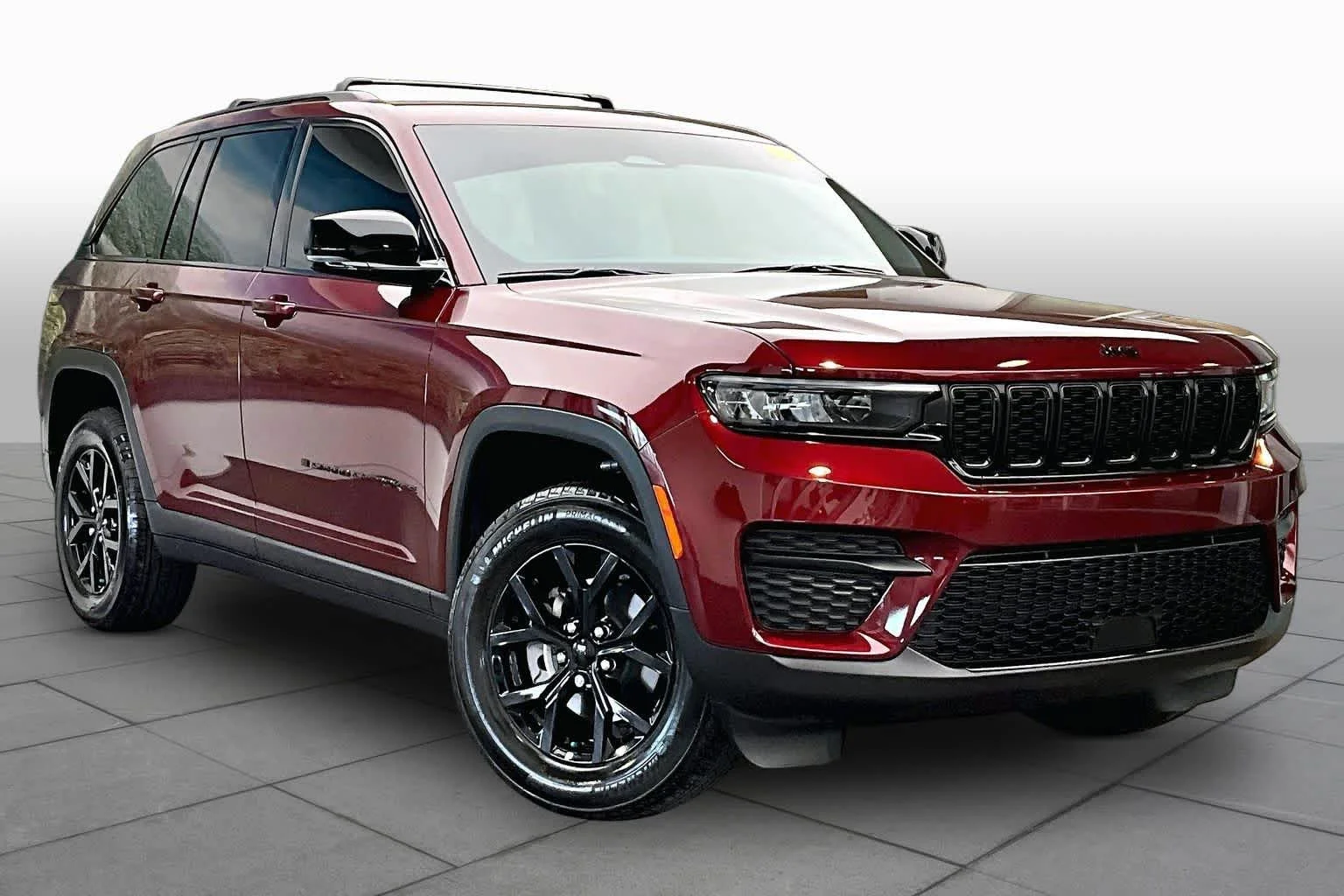 Used 2025 Velvet Red Pearlcoat Jeep Altitude image 3