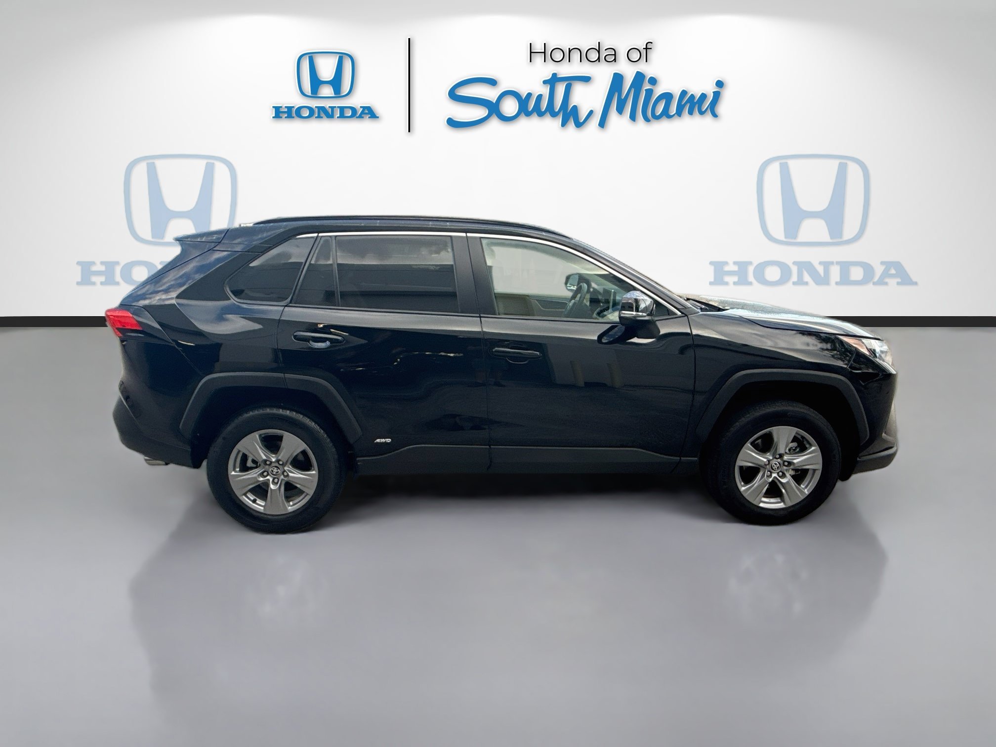 Used 2025 Midnight Black Metallic Toyota Hybrid LE image 8