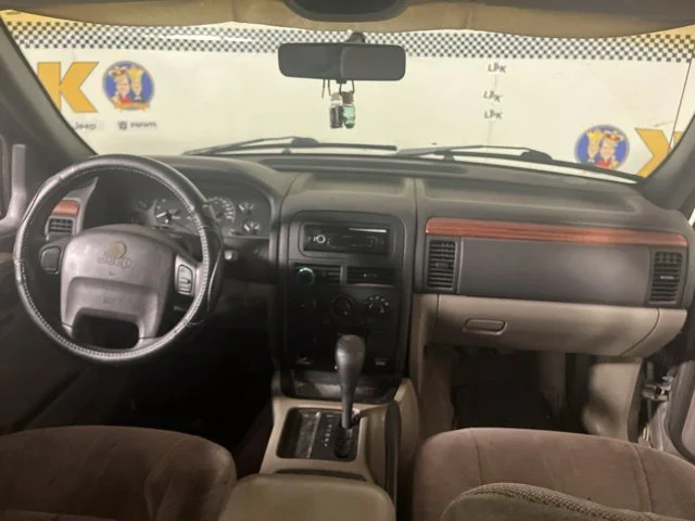 Used 1999 Taupe Frost Metallic Clear Coat Jeep Laredo image 16