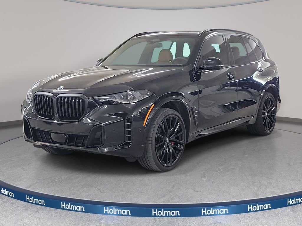 Certified Used 2025 Black Sapphire Metallic BMW sDrive40i image 1