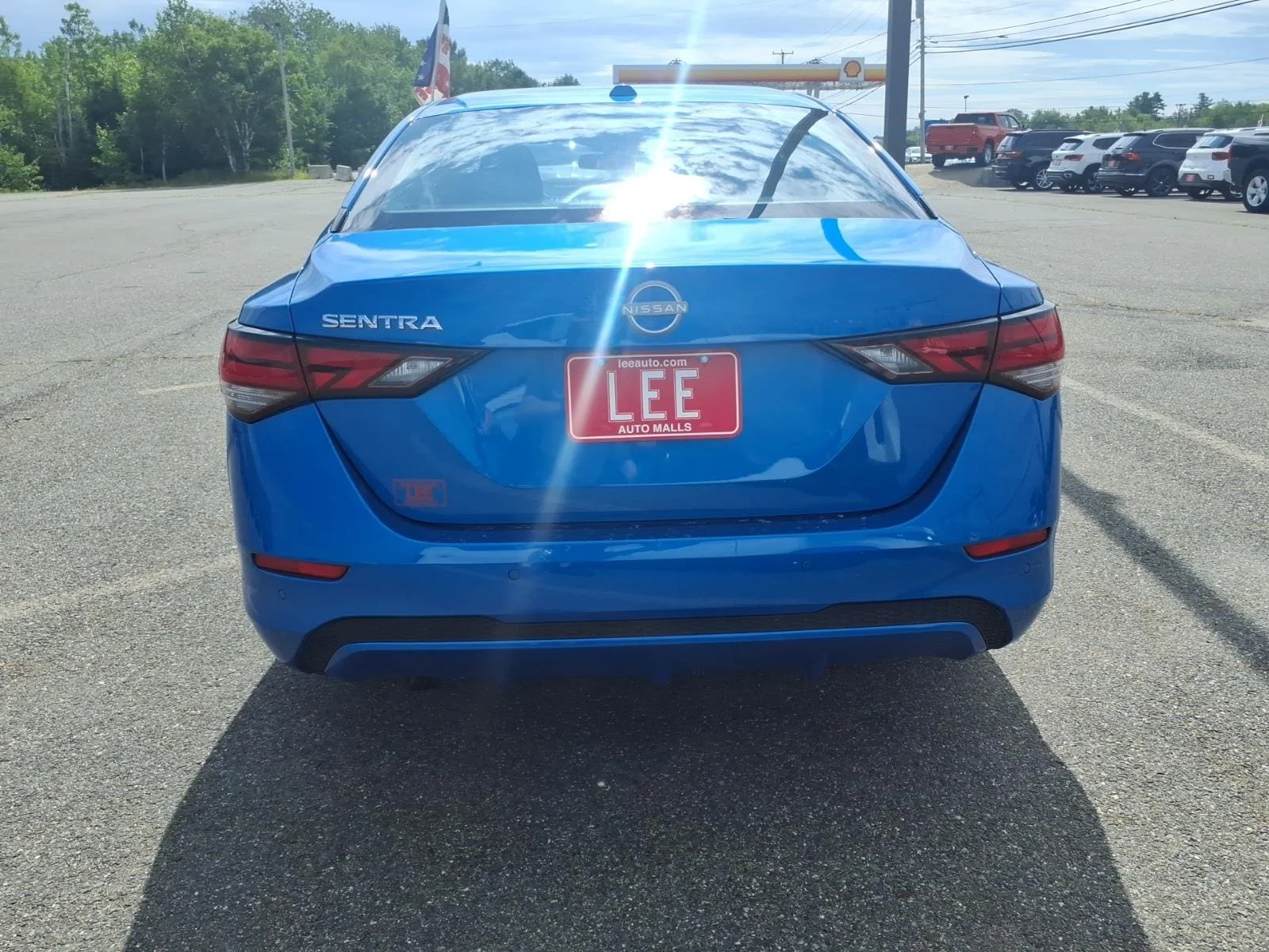 Used 2025 Electric Blue Metallic Nissan SV image 6