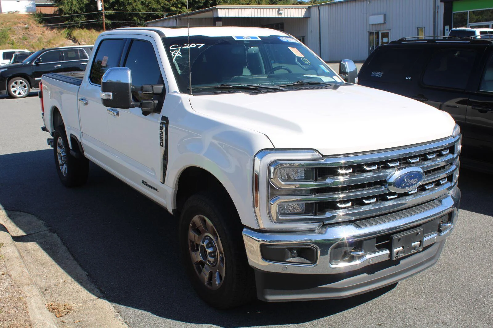 Used 2024 Star White Metallic Tri-Coat Ford Lariat image 3