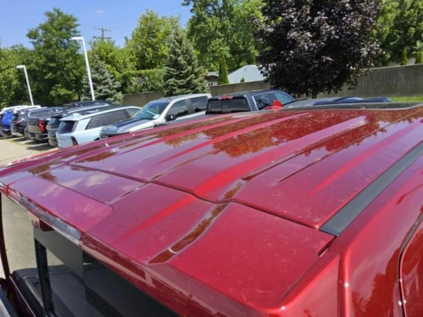 Used 2026 Volcanic Red Tintcoat GMC AT4X image 8