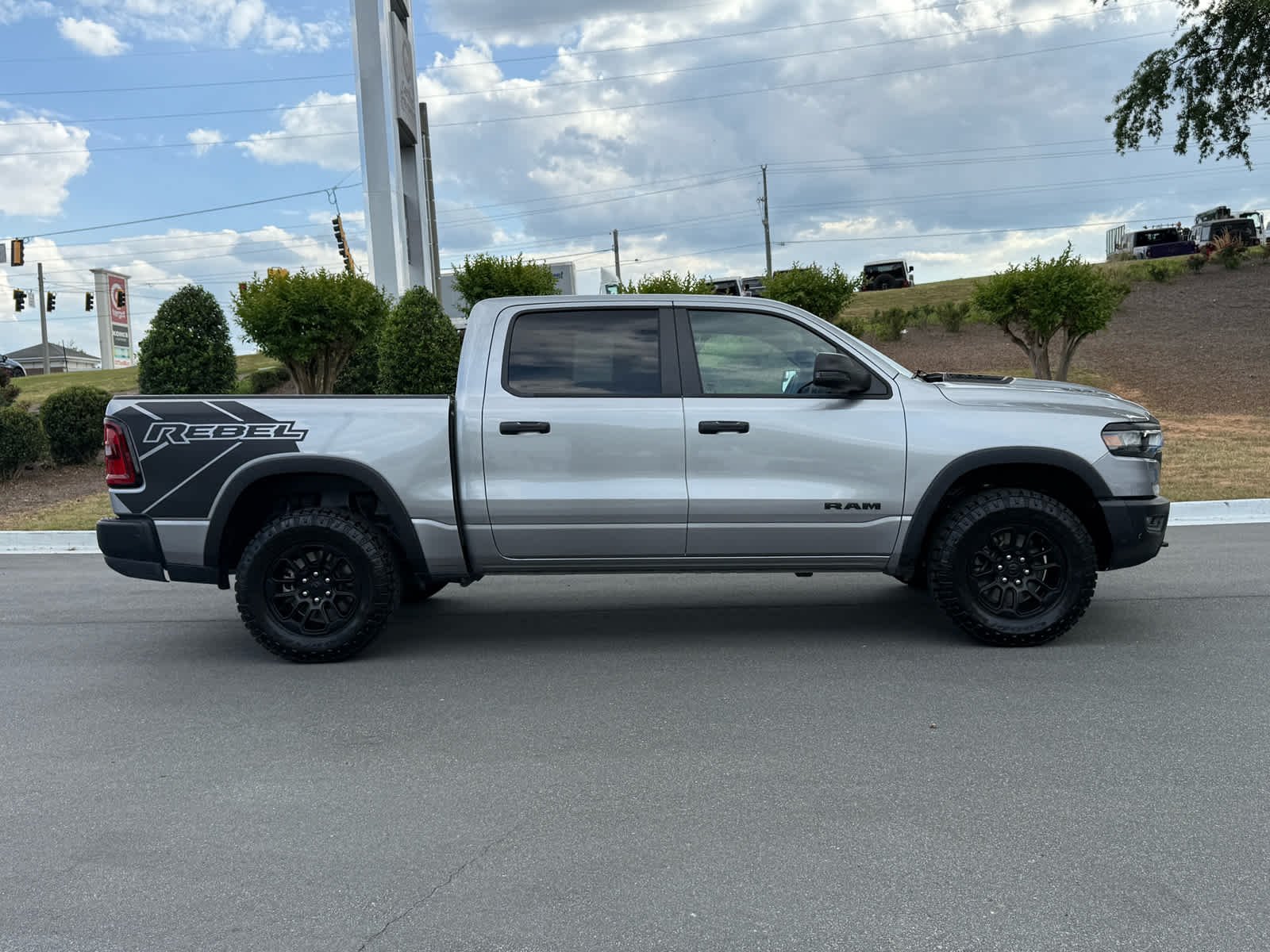 Used 2025 Billet Silver Metallic Clearcoat Ram Rebel image 6